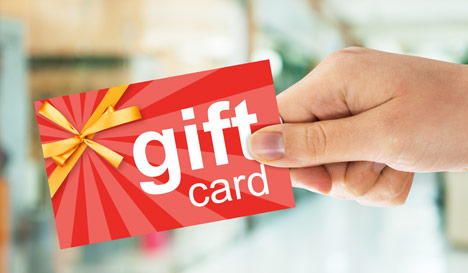 hand holding a gift card with text "gift card"